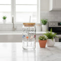 Personalized can glass with bamboo lid and straw featuring garden design for eco drinkware