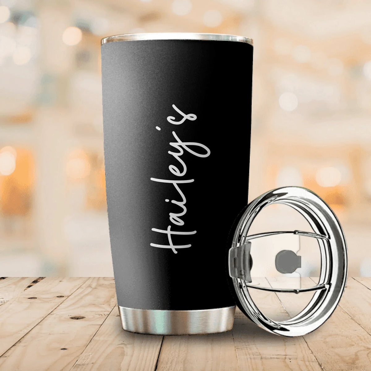 Personalized black stainless steel 20oz travel tumbler with custom name in full wrap sublimation print
