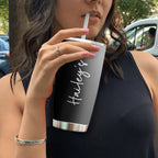 Personalized black stainless steel 20oz travel tumbler with custom name in full wrap sublimation print
