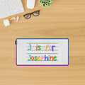 Personalized LED mouse pad with custom alternating color text design for modern desk setup
