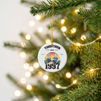 Personalized Together Since couples ceramic Christmas ornament hanging on a pine branch with warm holiday lights