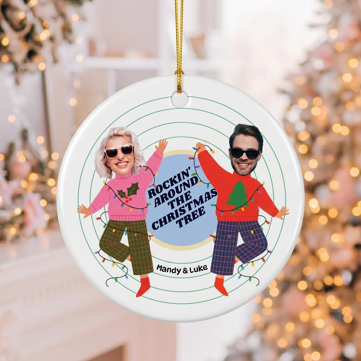 Custom photo ceramic Christmas ornament hanging against warm golden holiday bokeh