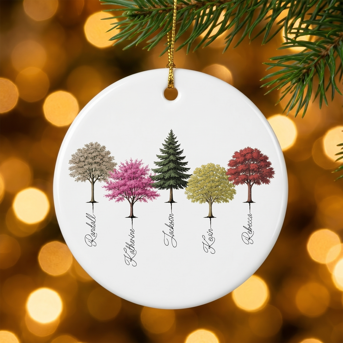 My Forest woodland ceramic Christmas ornament hanging on a pine branch with golden Christmas lights