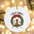 Custom dog Christmas ceramic ornament hanging against warm golden holiday bokeh
