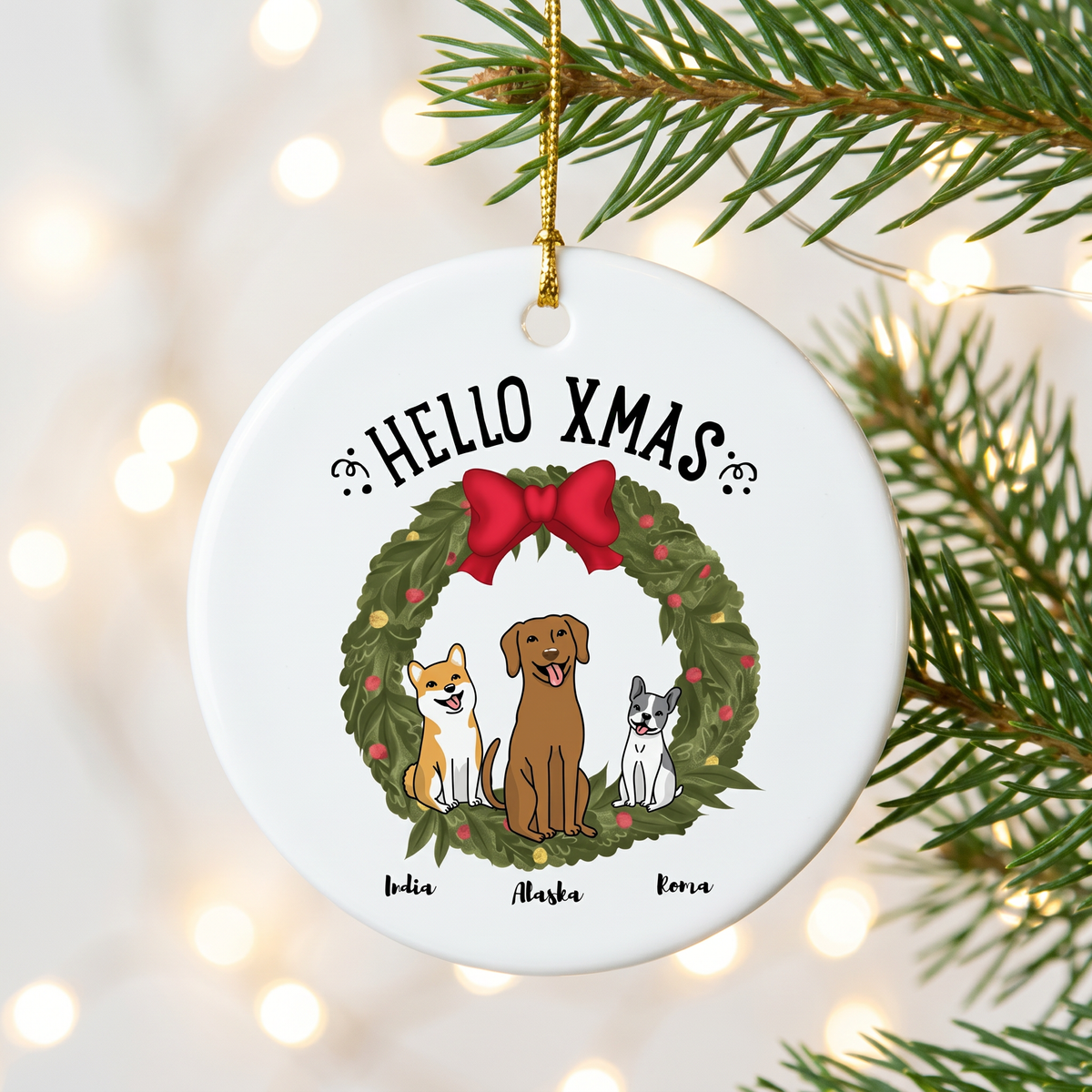 Custom dog Christmas ceramic ornament hanging on a pine branch with warm holiday lights
