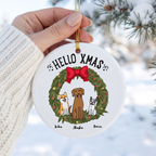 Hand holding a custom dog Christmas ceramic ornament in a white knit sweater