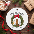 Custom dog ceramic Christmas ornament on a rustic wood table with cocoa