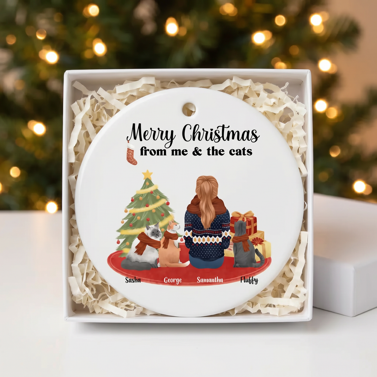 Cat lover ceramic Christmas ornament in an open white gift box with shredded paper