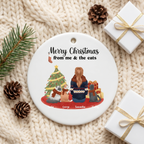 Cat lover ceramic Christmas ornament on a cream knit blanket with pine and a gift