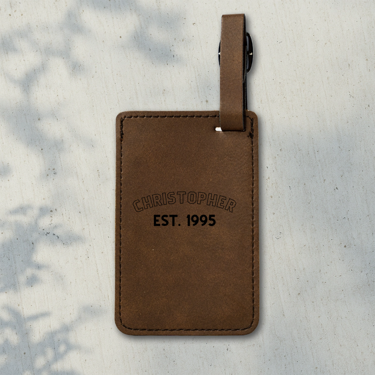Personalized engraved luggage tag for keeping travel gear identifiable and stylish