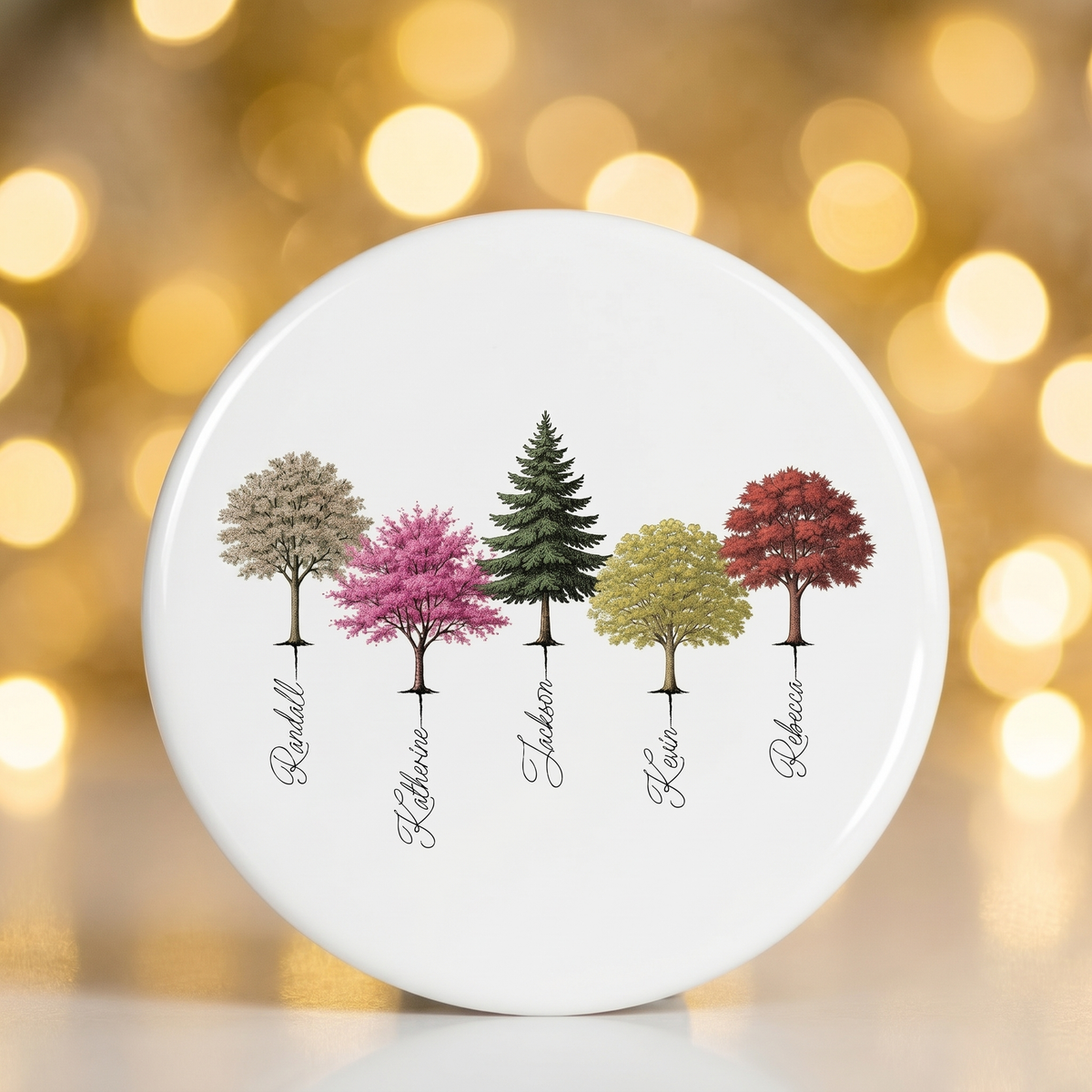 Personalized My Forest family tree ceramic ornament against warm golden Christmas bokeh