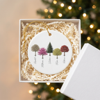 My Forest family tree ceramic ornament in an open white gift box with shredded paper filler