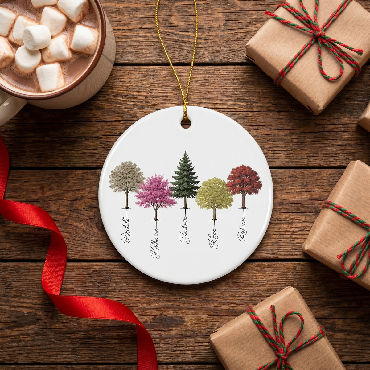 My Forest family tree ceramic ornament on a rustic dark wood table with cocoa and wrapped gifts