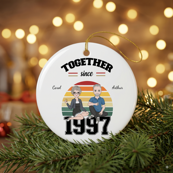 Together Since 1997 personalized ceramic ornament for Carol and Arthur with a clipart couple, on a pine branch